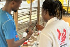 1_A-farmer-capturing-real-time-information-scaled